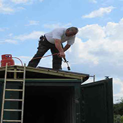 Metal shed: roof being prepared